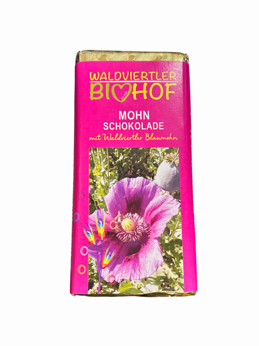 BIO mléčná čokoládou plněná mandlovým nugátovým krémem a waldviertelským modrým mákem. 
