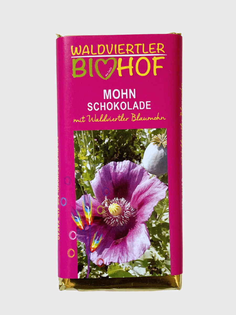 BIO mléčná čokoláda plněná mandlovým nugátovým krémem a waldviertelským modrým mákem.